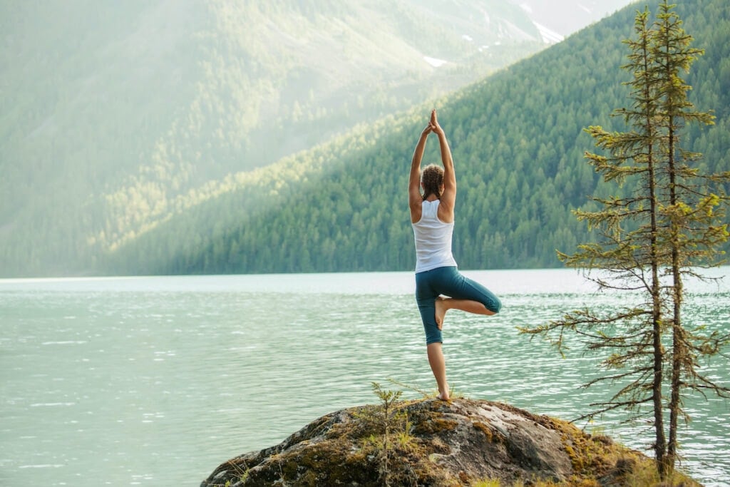 Yoga outside // If you're planning on thru hiking, learn how to train for a thru hike mentally and physically with these tips from PCT and JMT thru hikers.