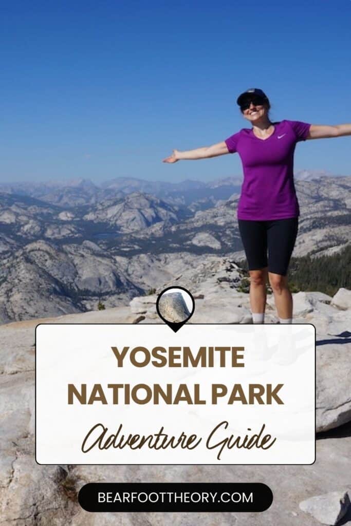 A person stands on a mountain summit with arms outstretched against a backdrop of distant peaks and clear blue sky. Text overlay reads: "Yosemite National Park Adventure Guide." Website URL at the bottom reads: "bearfoottheory.com.