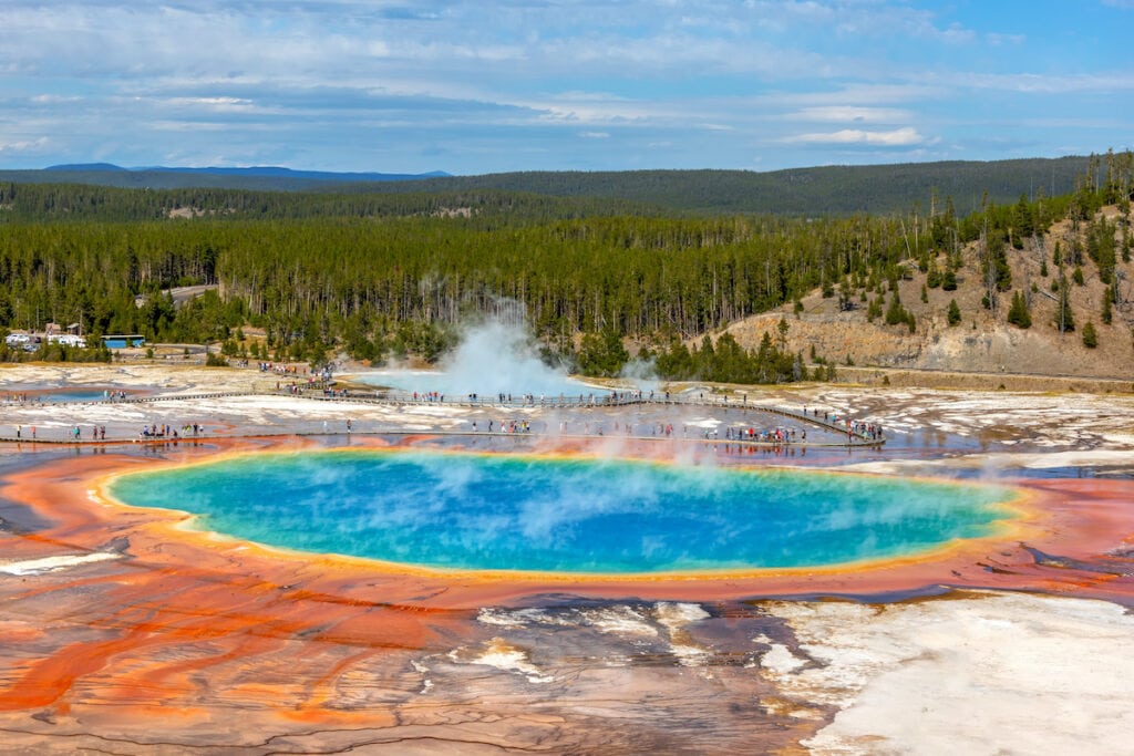 Yellowstone Grand Prismatic Spring // Planning a trip to a popular National Park? Here are tips to beat the crowds and have an enjoyable visit in overcrowded National Parks.