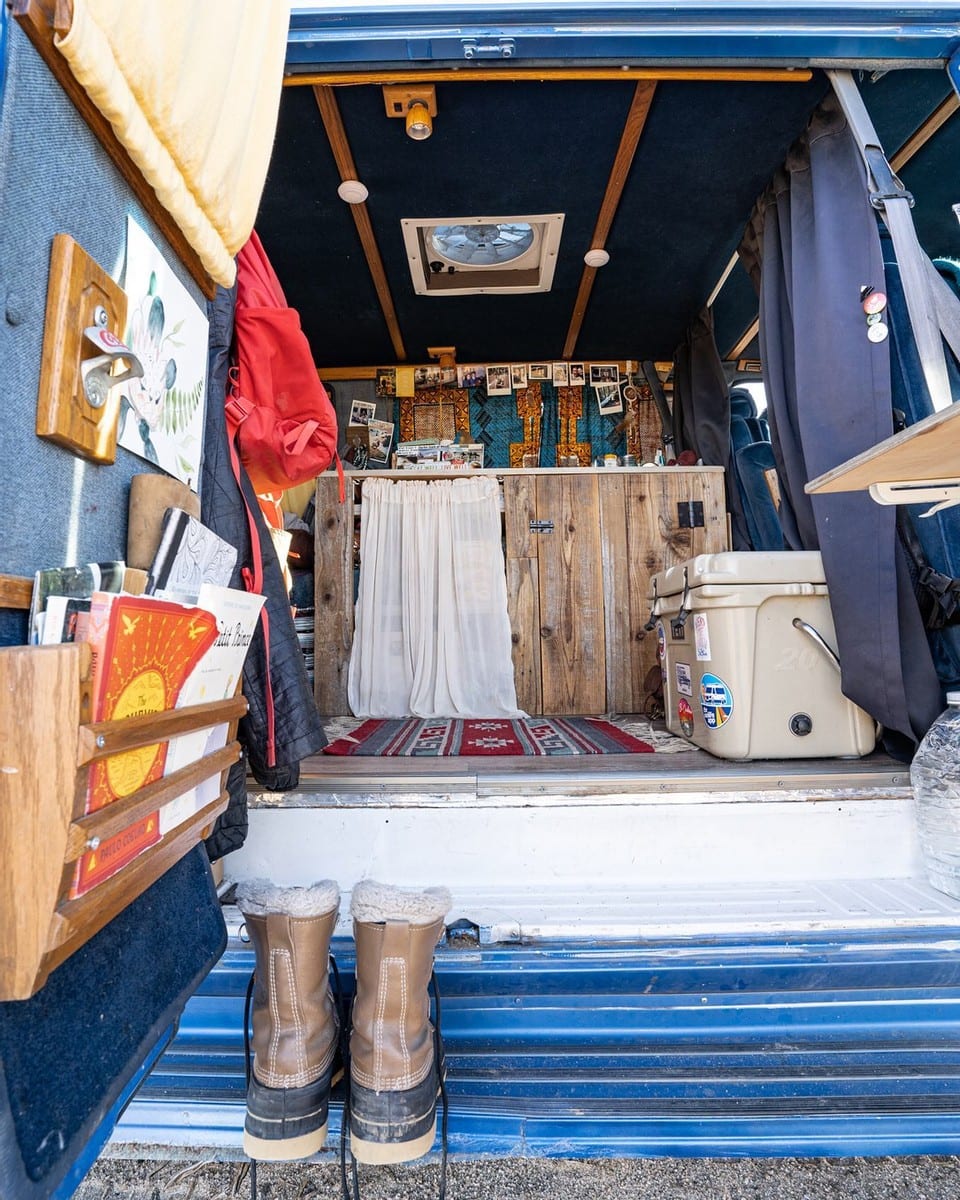 Interior of a Chevy G20 Camper Van // Learn how to save money on your DIY camper van build with 5 easy tips from how to choose a used van to how to do a cheap van conversion.