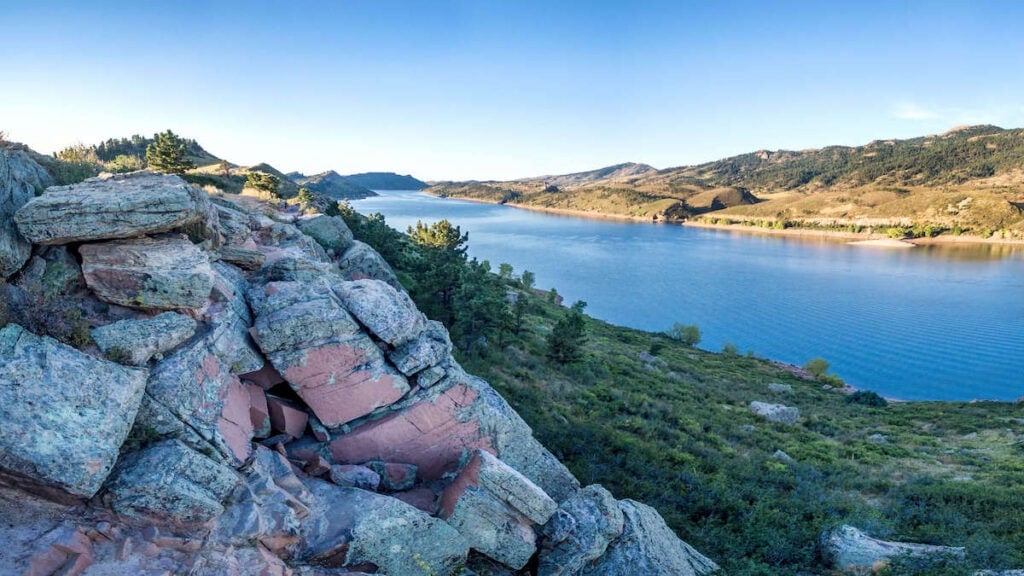 Horsetooth Reservoir // Discover the best places to SUP in Colorado this summer with the best Rocky Mountain views, calm waters, and quiet solitude. 