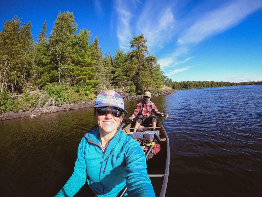 Two people in a canoe on a lake