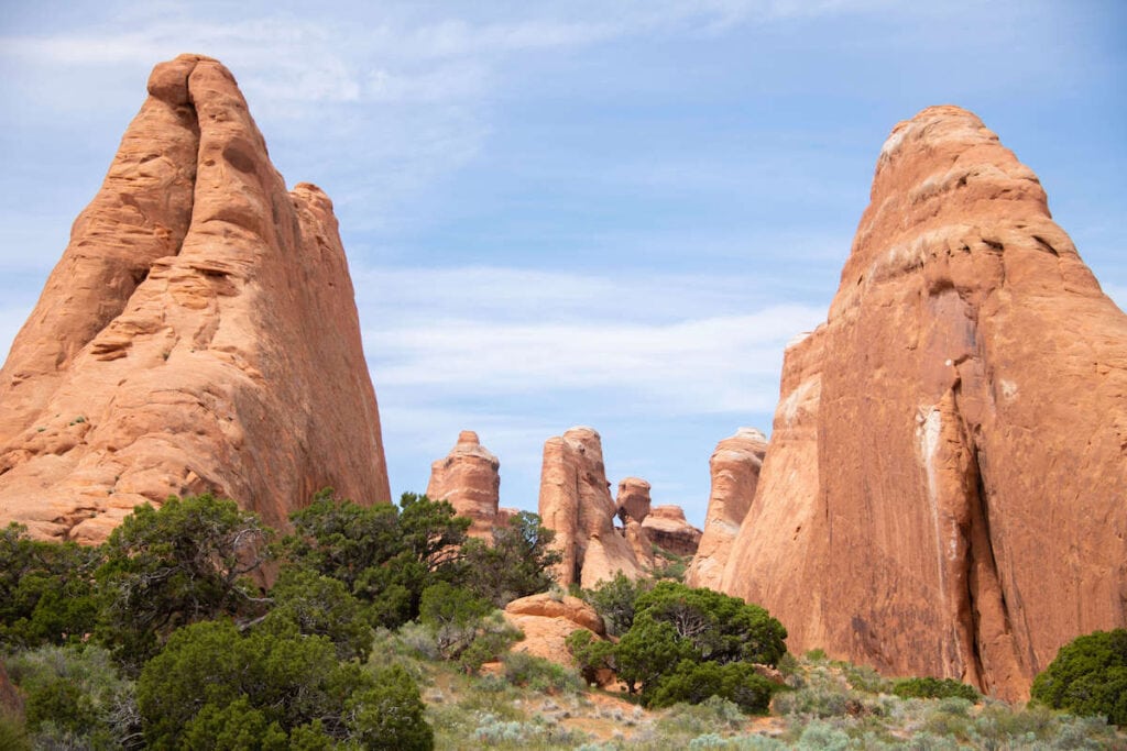 Tall red rock formations near Devil's Garden Campground in Aches National Park, Moab