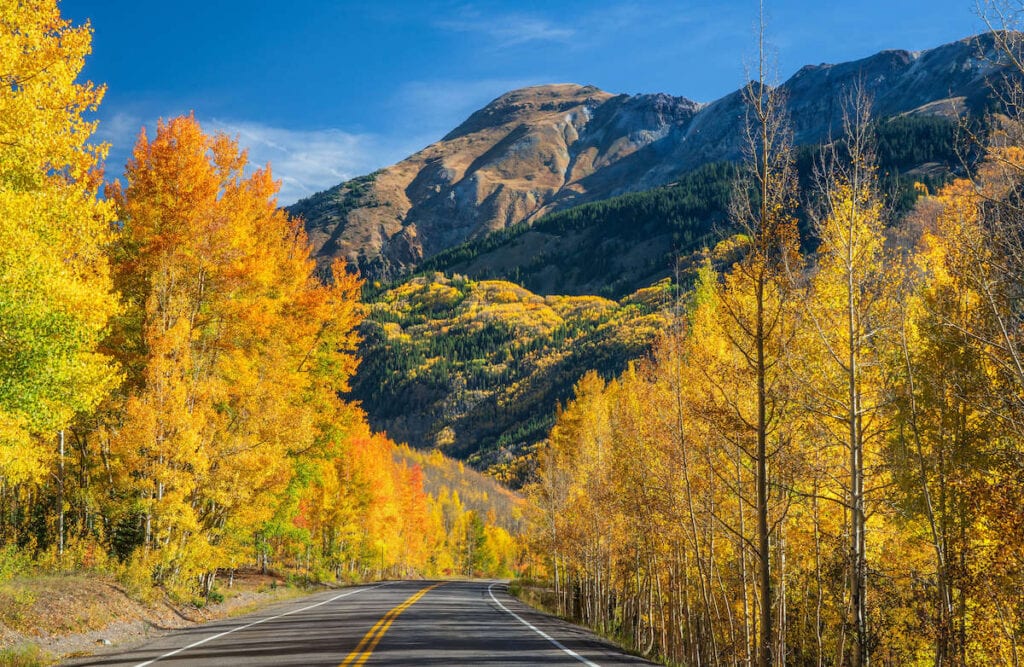 Drive Colorado's Million Dollar Highway and San Juan Skyway to see amazing views of the Rocky Mountains and visit small mountain towns.