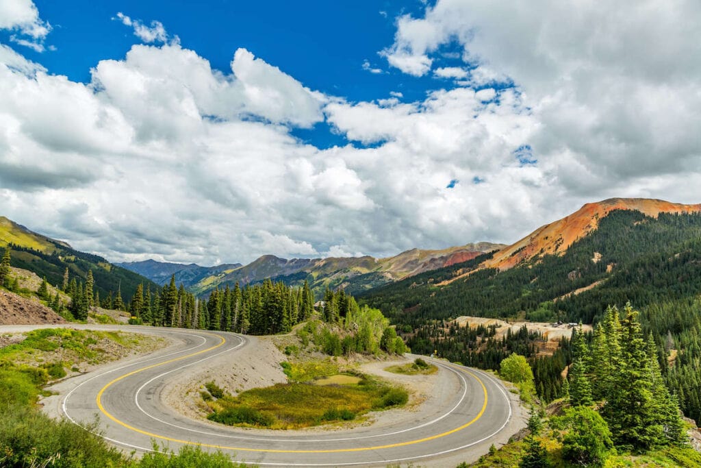 Drive Colorado's Million Dollar Highway and San Juan Skyway to see amazing views of the Rocky Mountains and visit small mountain towns.