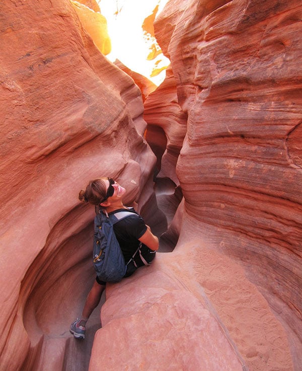 Bearfoot Theory founder Kristen Bor hiking in Spooky slot canyon in Grand Staircase-Escalante National Monument