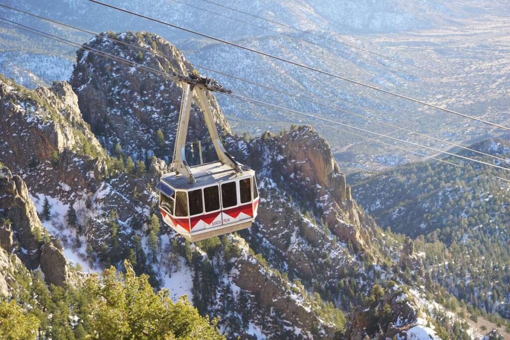 Sandia Crest // Discover the best snowshoeing destinations west of the Rockies that are perfect for a winter snowshoeing getaway without the crowds.