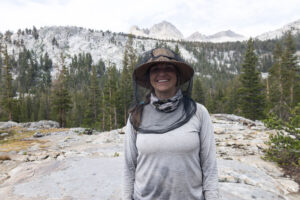 Kristen Bor wearing a mosquito net while hiking in Sequoia National Park