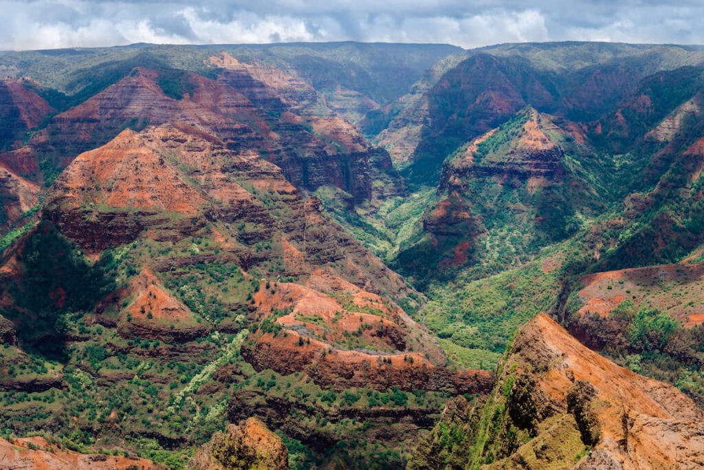 Waimea Canyon // Discover the best things to do in Kauai for outdoor adventurers including scenic waterfall hikes, secluded beaches, water activities, & more!