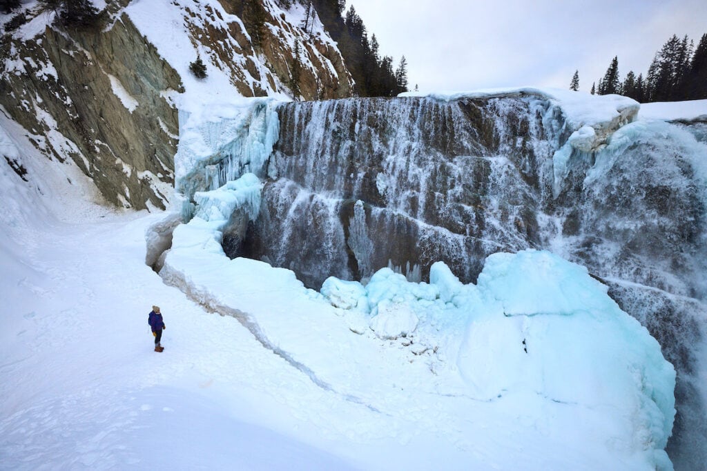 Standing at the base of Wapta Falls in Yoho National Park near Golden
