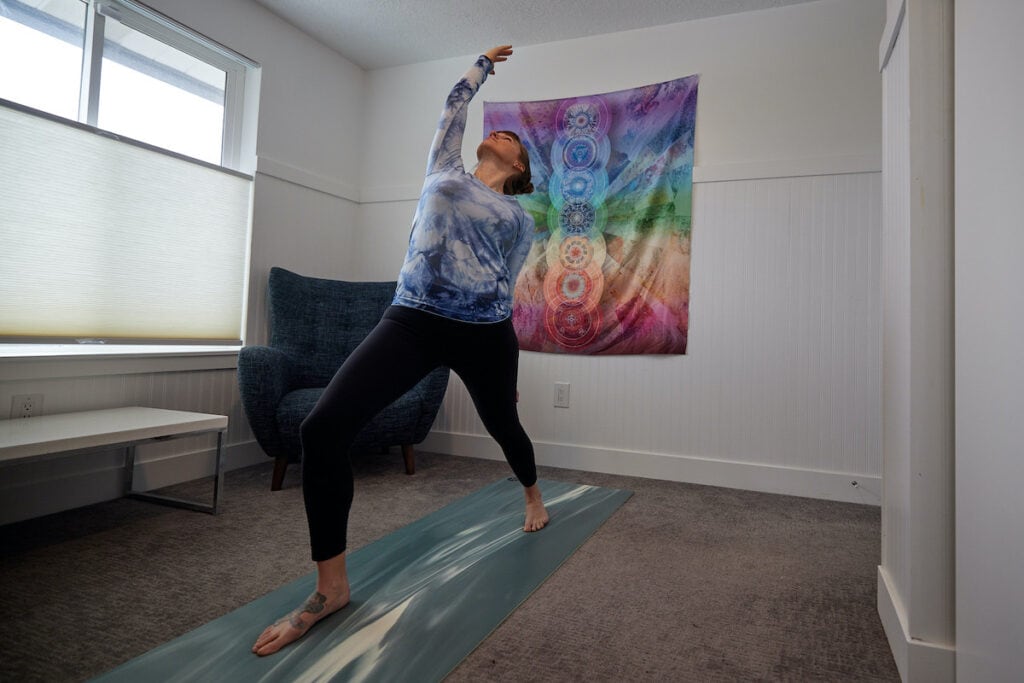 Woman practicing yoga in the lululemon Align High Rise Pant, a must have legging for working out