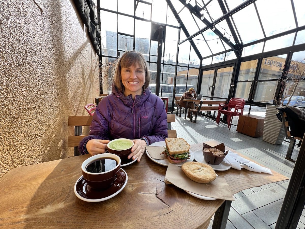 Woman sitting at a table in a coffee shop