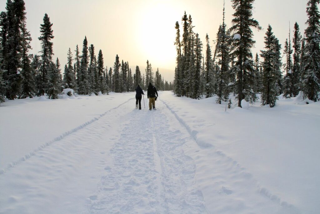 two people snowshoeing in Coldfoot in Alaska in winter