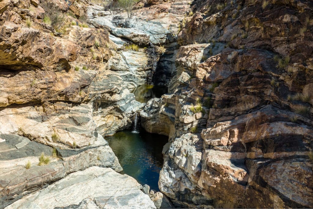 a waterfall at Tanque Verde - one of the best hikes in Tucson Arizona