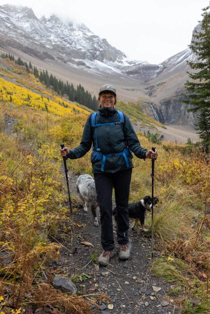 woman smiling on a fall hike in Colorado (Kilpacke Trail) wearing Arc'teryx Gamma hiking pants