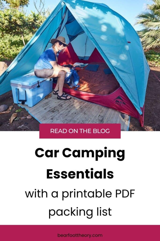 Kristen Bor sitting on a cooler in front of a blue tent with text that says "Car Camping Essentials with a printable PDF packing list"