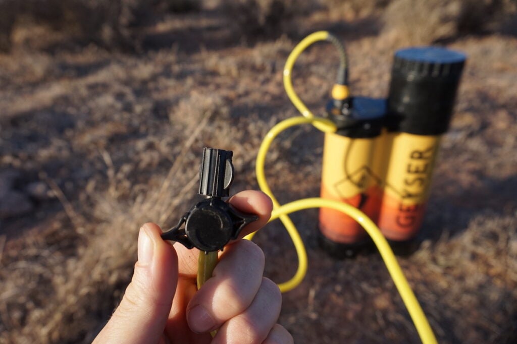 The hose nozzle on the Geyser Systems Portable Shower