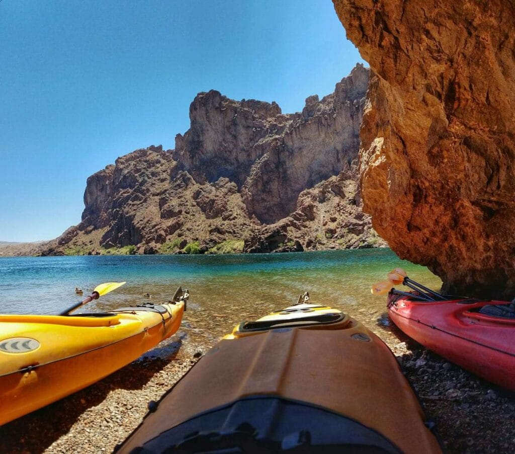 Three kayaks on beach on the Black Canyon Water Trail in Nevada