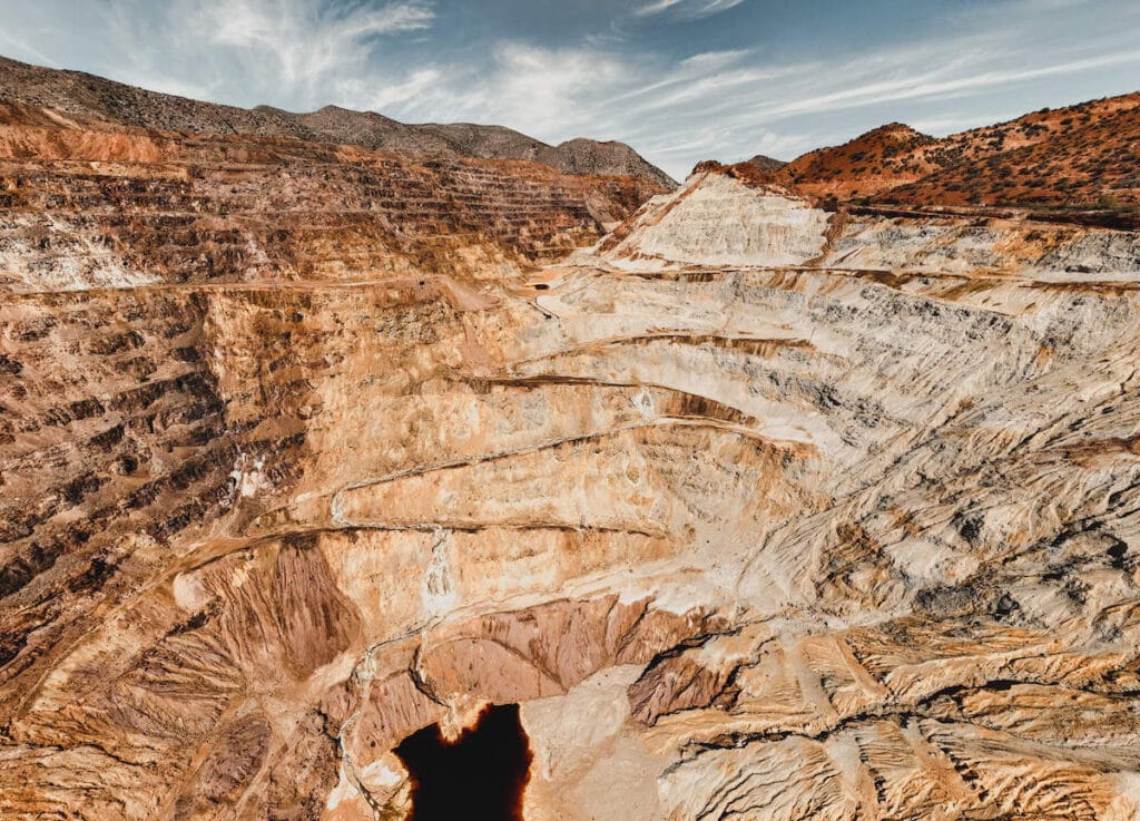 Deep open mine dug out of rock called the Lavender Pit in Bisbee Arizona