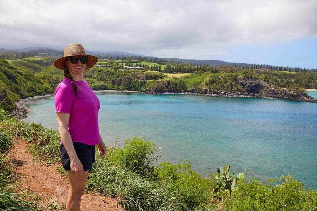 A woman on the coast of Maui wearing The North Face Aphrodite Shorts