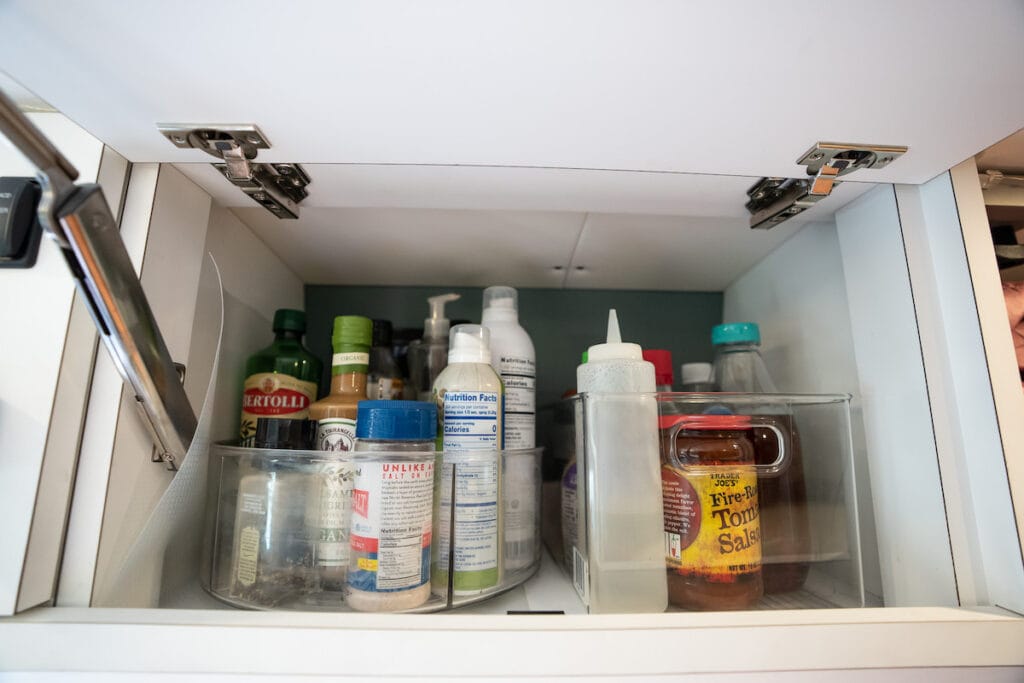 Overhead cabinets in a 4x4 Mercedes Sprinter Van conversion built by Outside Van