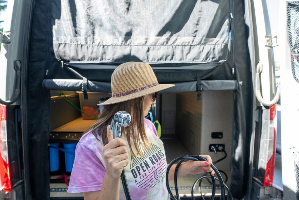 Outdoor shower hookup in a Sprinter Van conversion