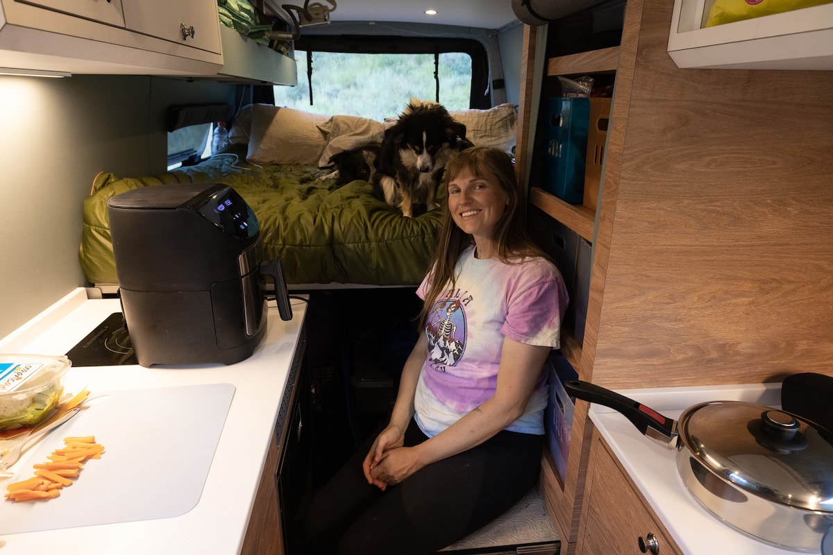 Step for getting into platform bed in a Sprinter Van conversion built by Outside Van