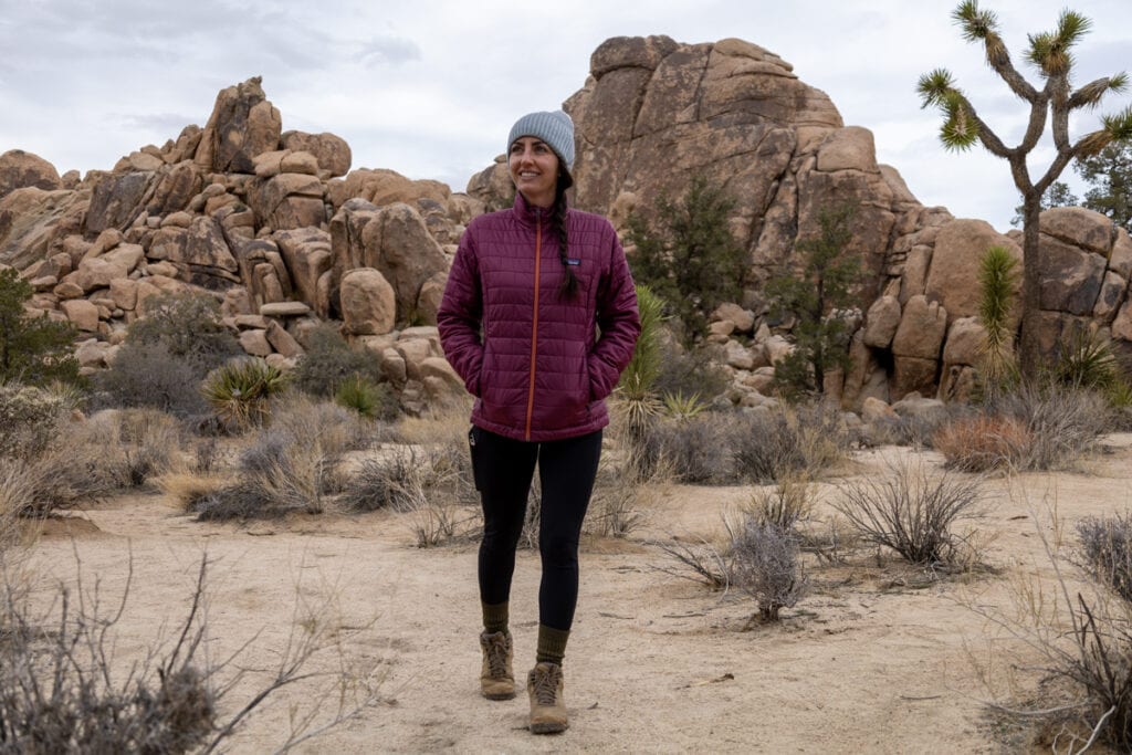 Woman hiking in the lululemon Fast and Free High Rise Tights, a must have legging for hiking