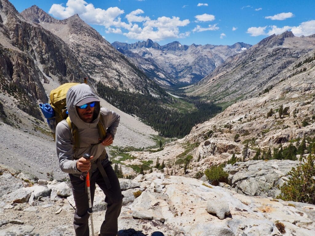 A man looking serious at the top of The Golden Staircase on the JMT