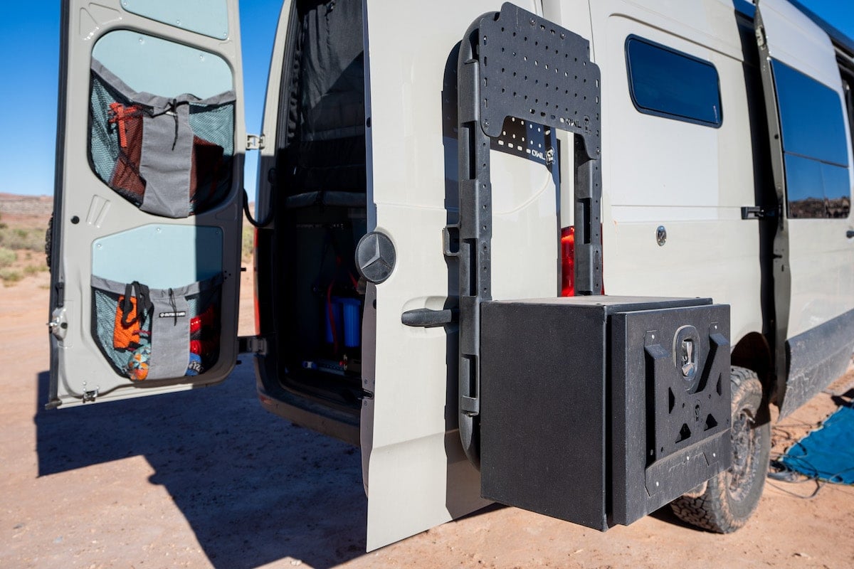 Owl Vans Medium Expedition Box van accessories mounted on the back of a Sprinter van. The back doors of the van are open.