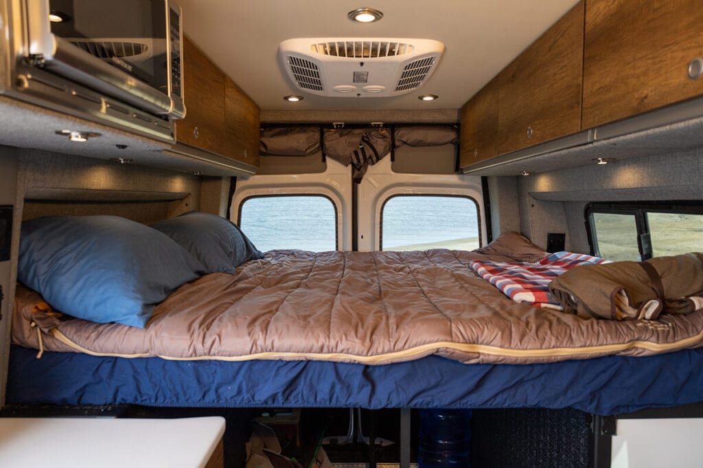 Interior of the Storyteller Overland Classic MODE van showing the well thought out lighting