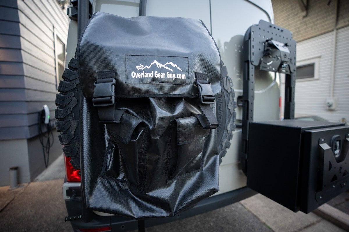 Overland Gear Guy Spare Tire Trash Bag on the back of a Sprinter Van