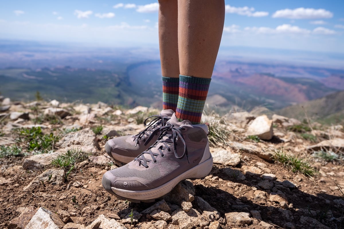 Oboz Katabatic LT Mid hiking shoes on top of a mountain