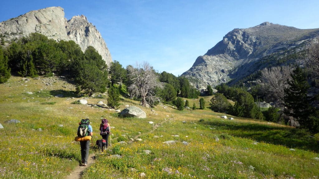 two backpackers on the Cirque of the Towers trail in Wyoming