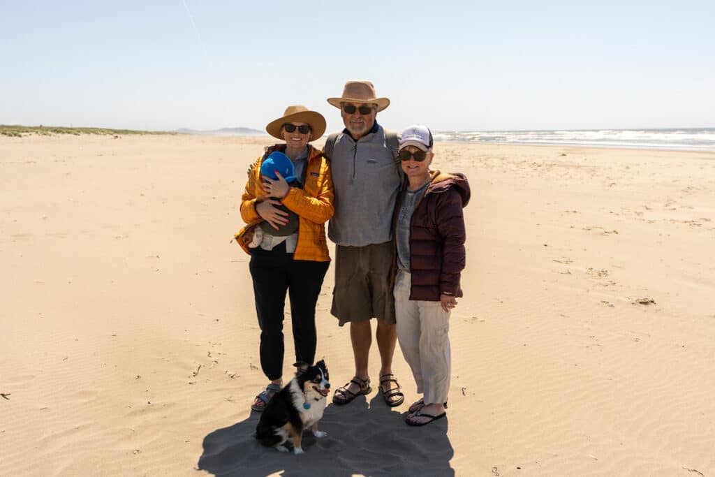 Kristen Bor and her family standing on the beach on a sunny day in Long Beach Washington