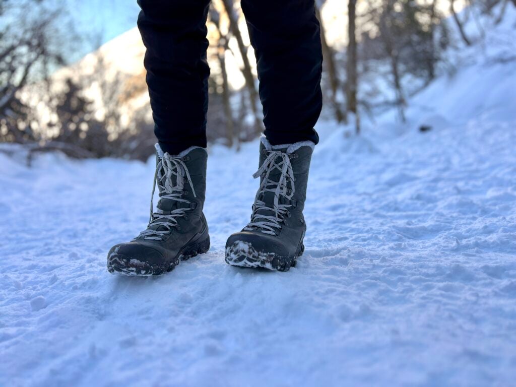 Oboz Bridger Insulated womens hiking boots on a snowy trail