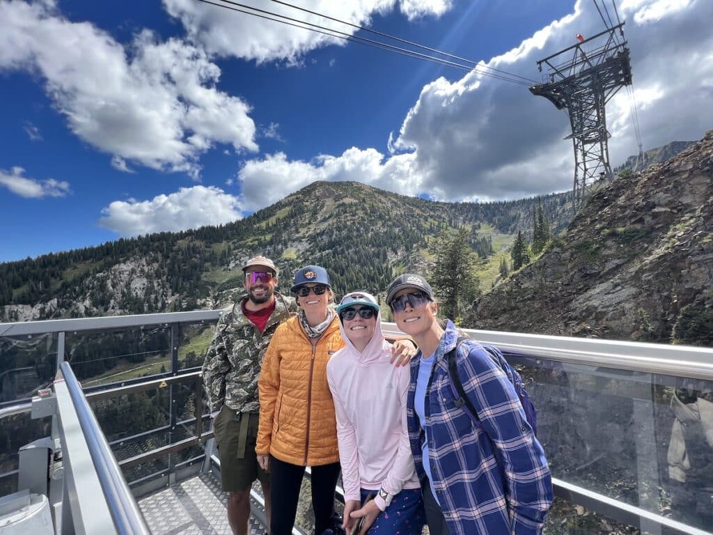 Group of people standing on the top of the tram at Snowbird Ski Resort