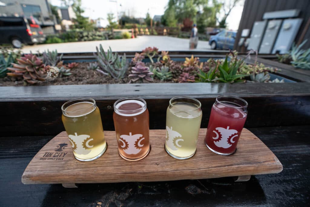 Flight of four ciders at cidery in Tin City, California