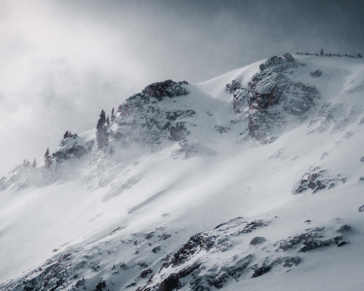 Snow blowing on Saint Mary's Glacier in winter in Colorado