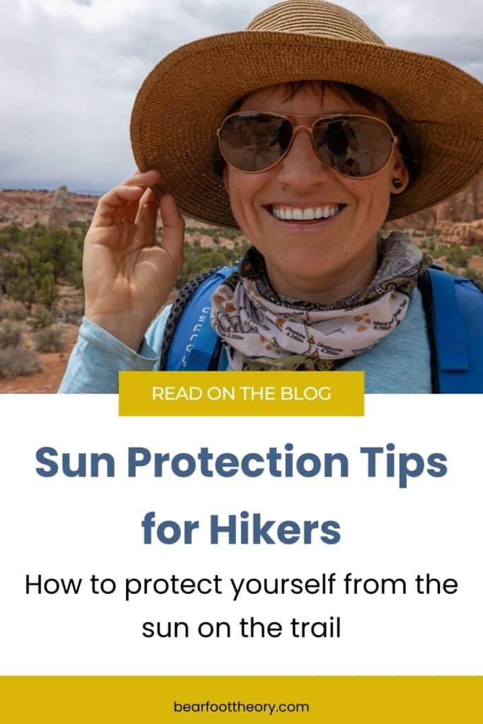 Kristen Bor wearing a sun hat in the desert with the text "sun protection tips for hikers. how to protect yourself from the sun on the trail"