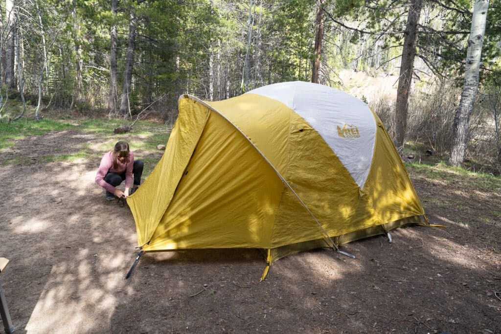 Kristen Bor setting up the REI Base Camp 4 tent