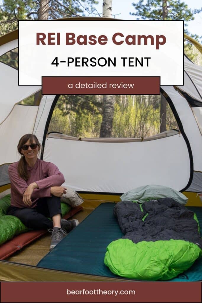 Woman sitting inside tent. Text reads REI Base Camp 4-Person Tent - A detailed review.