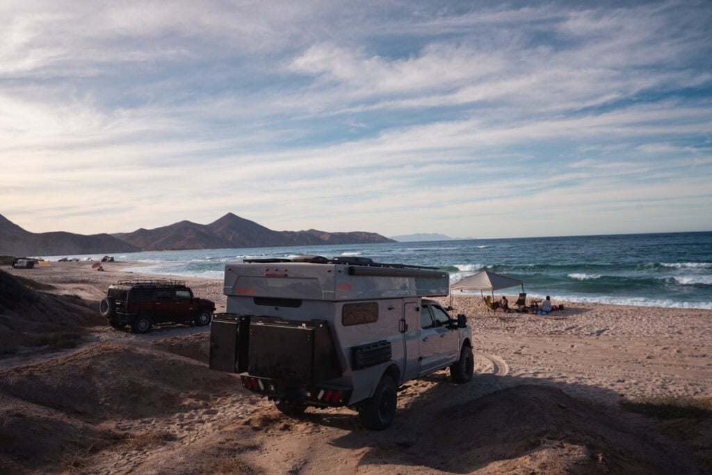 Rossmonster Baja Trail LX parked next to a Hummer on the beach in Baja