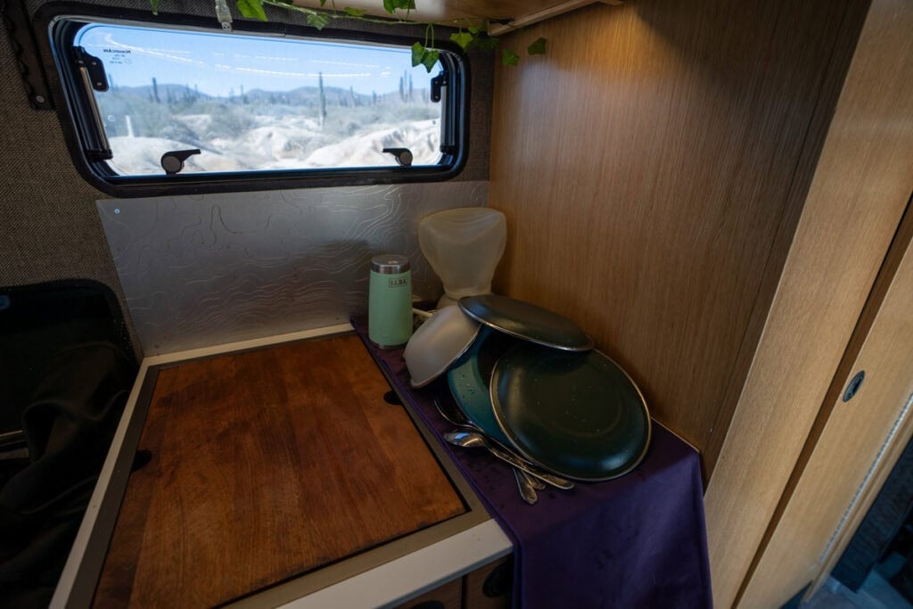 Dishes drying next to the sink in the Rossmonster Baja Trail LX