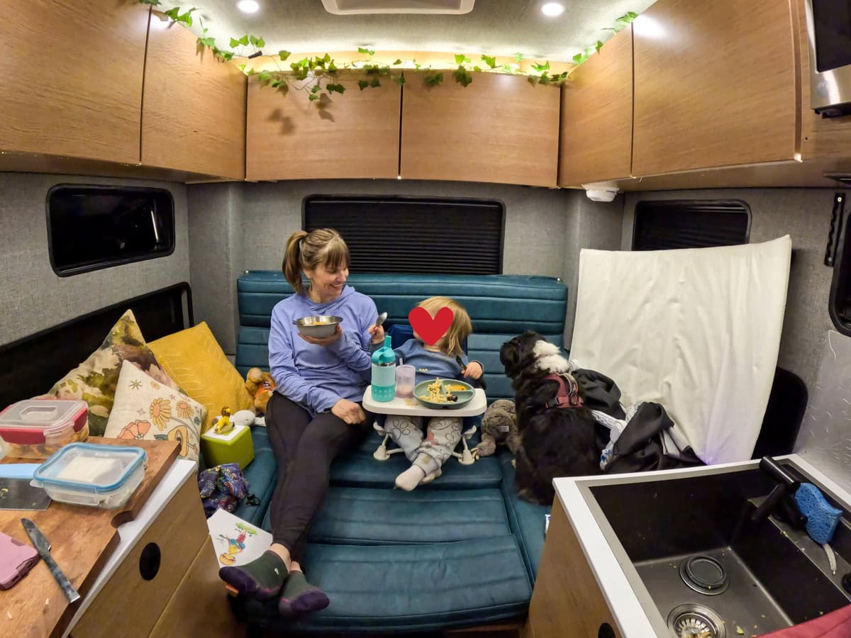 Kristen Bor and her son sitting on the second bed in the Rossmonster Baja Trail LX