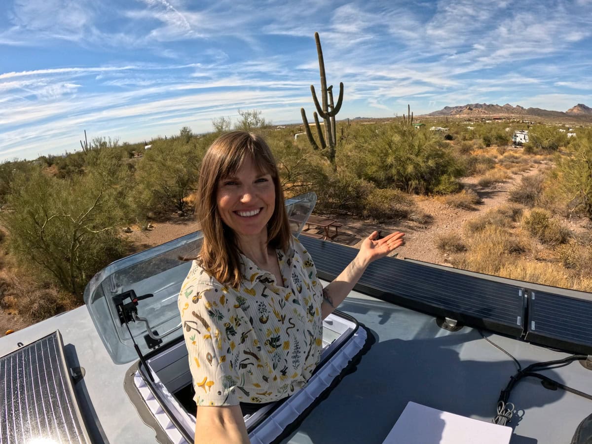 Kristen Bor standing in the skylight of the Rossmonster Baja Trail LX