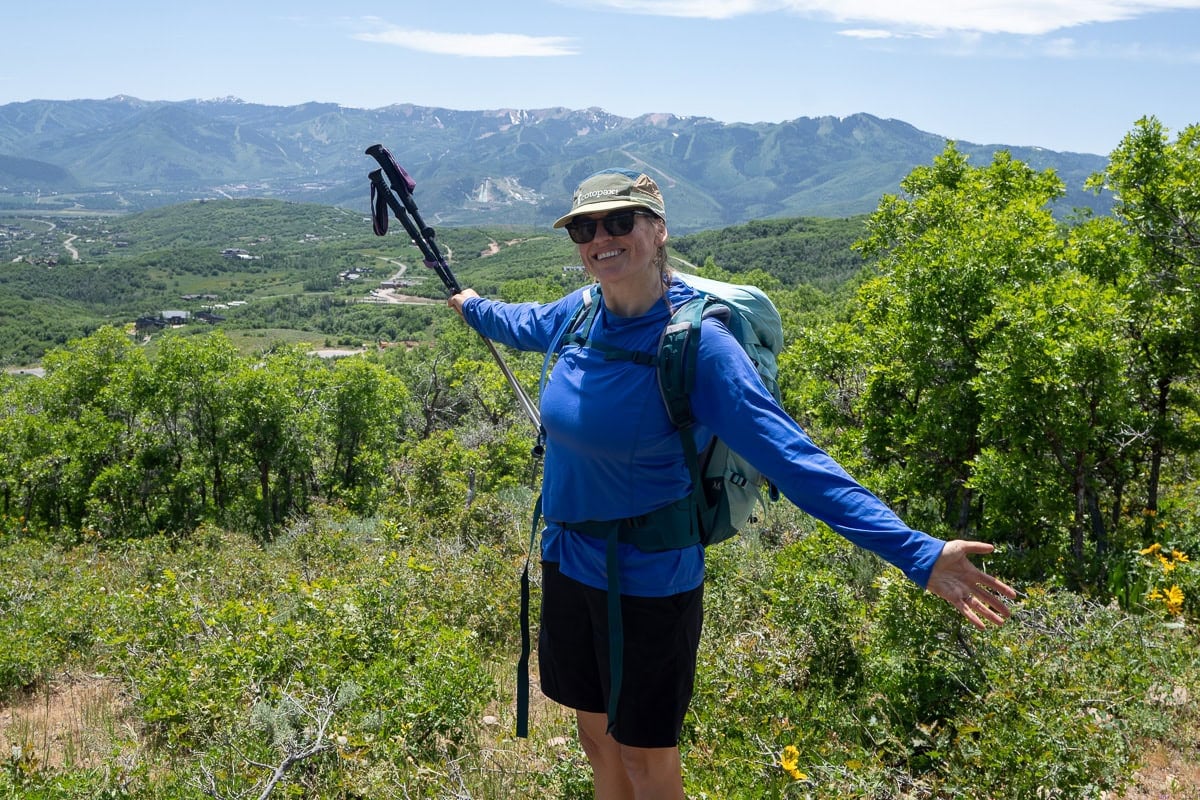 Kristen Bor on a hiking trail in Park City wearing the deuter trail 28 sl hiking backpack